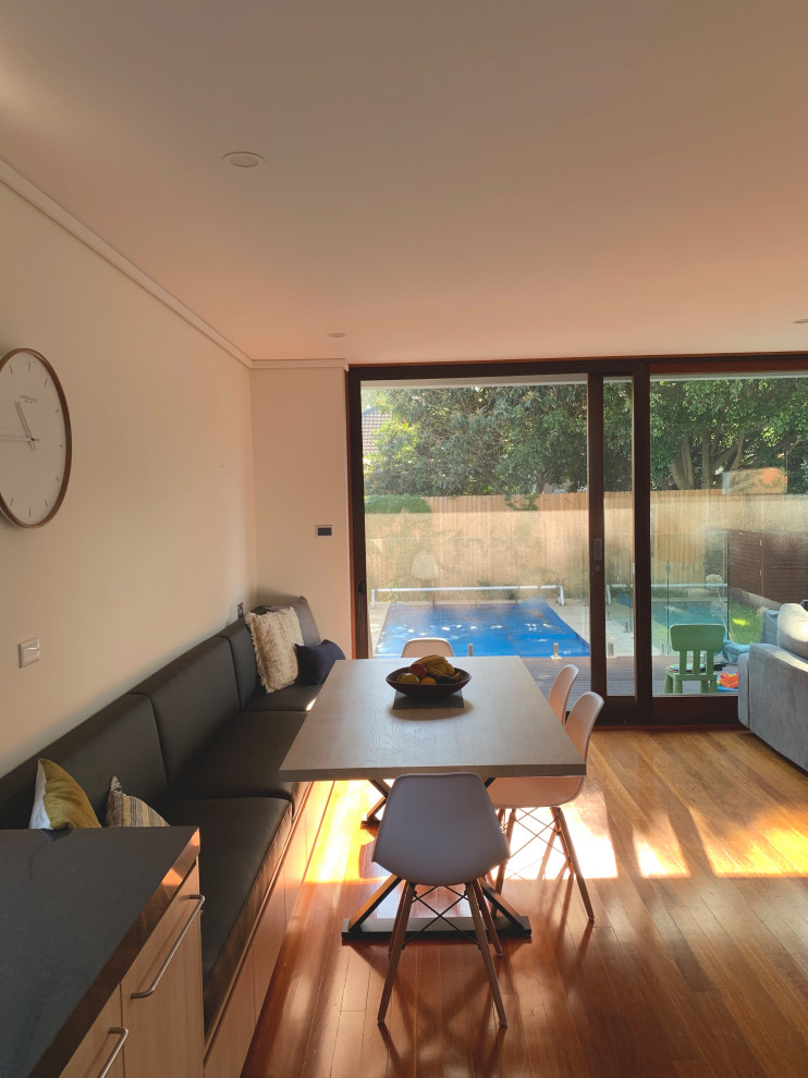 Medium sized contemporary dining room in Sydney.