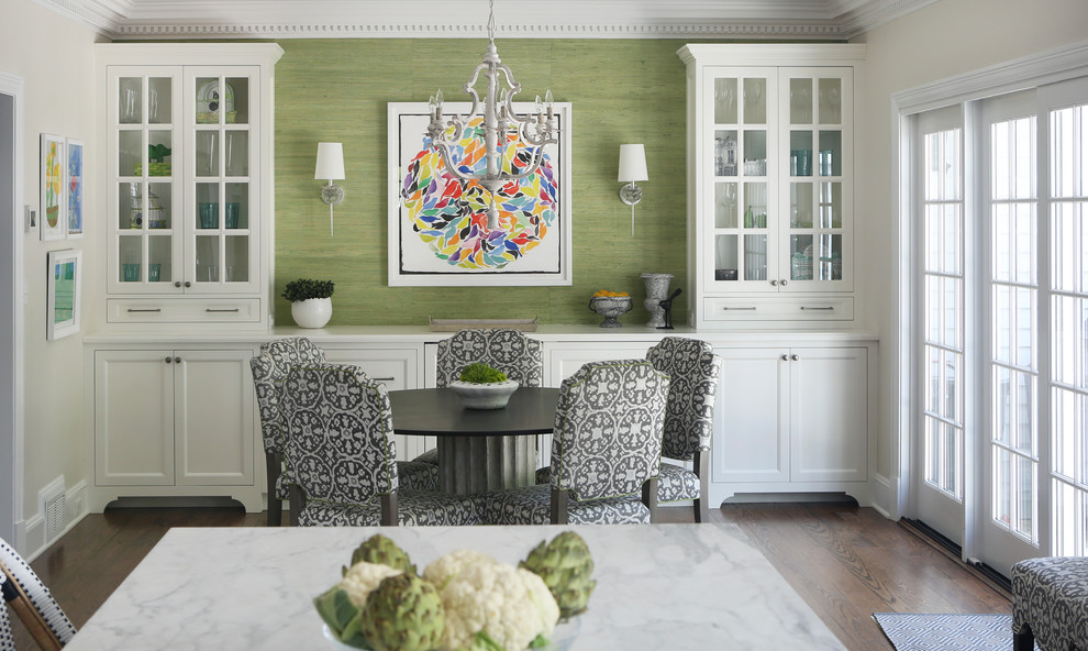Large transitional galley medium tone wood floor kitchen/dining room combo photo in New York with a single-bowl sink, recessed-panel cabinets, white cabinets, marble countertops, multicolored backsplash, mosaic tile backsplash, stainless steel appliances and an island