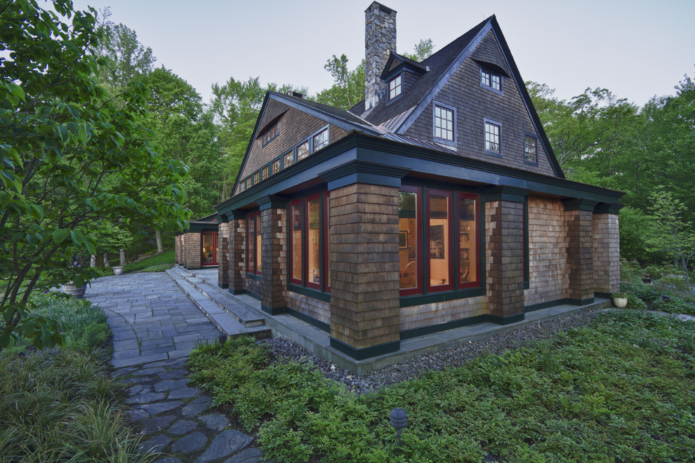 Design ideas for a traditional three-storey exterior in New York with wood siding.