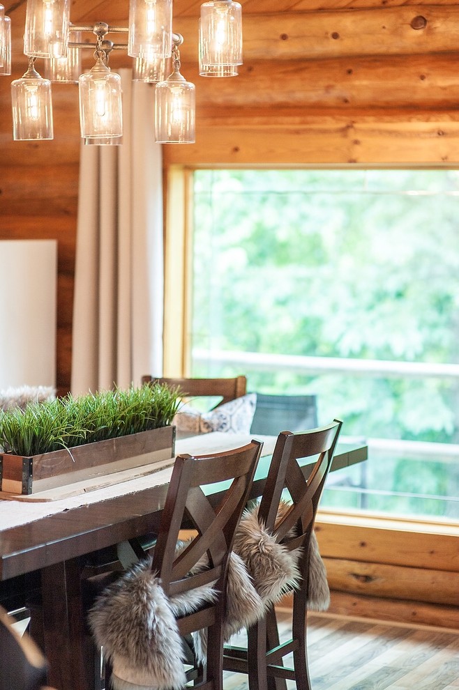 Example of a mountain style home design design in Calgary