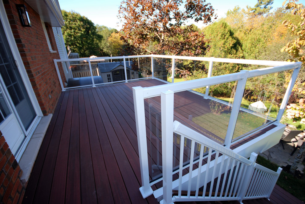 Deck - mid-sized modern backyard deck idea