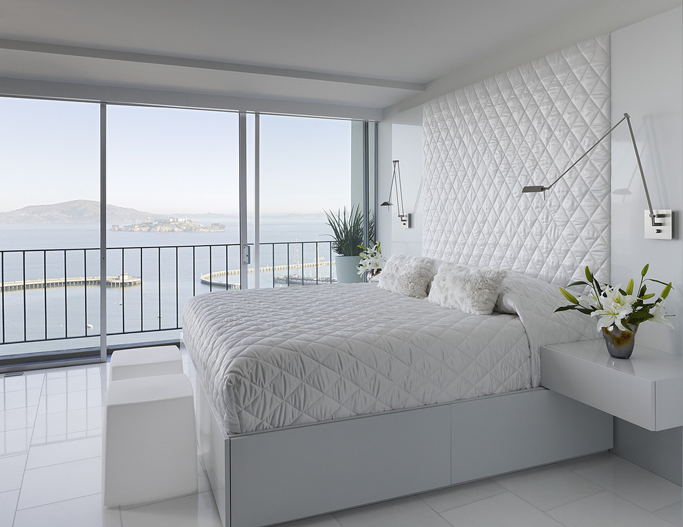 Modern bedroom in San Francisco with white walls, marble floors and white floor.