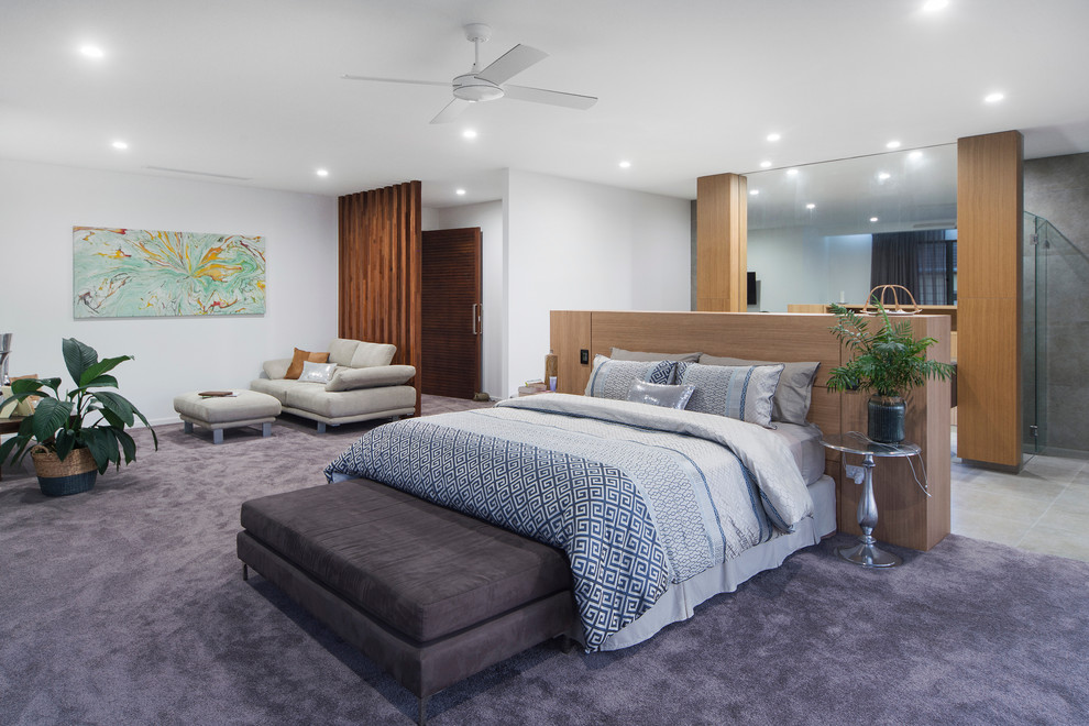 Photo of a contemporary bedroom in Gold Coast - Tweed with white walls.