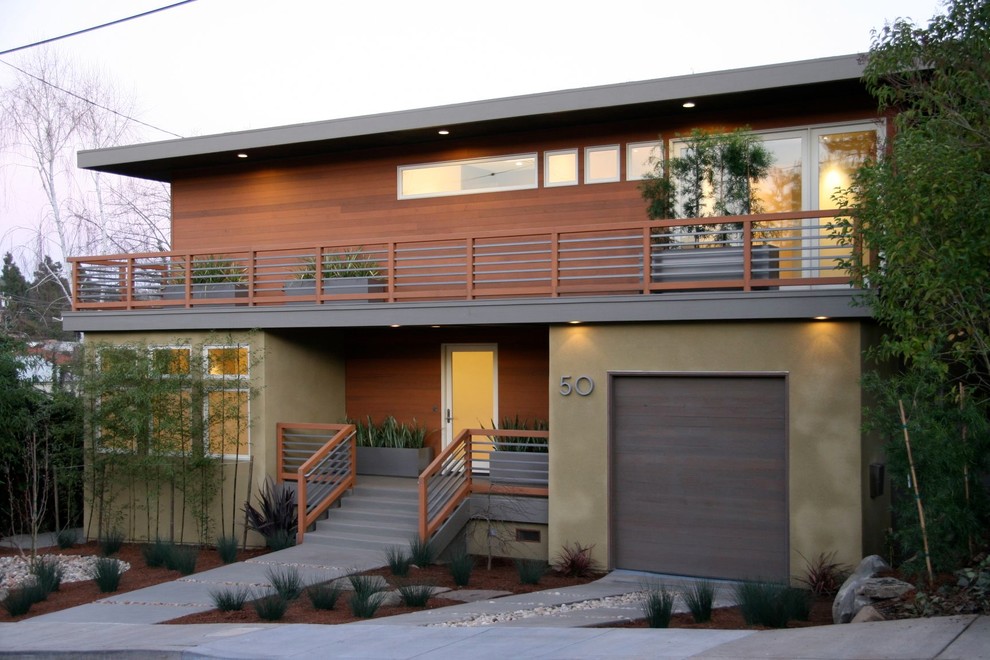 This is an example of a contemporary exterior in San Francisco with wood siding.