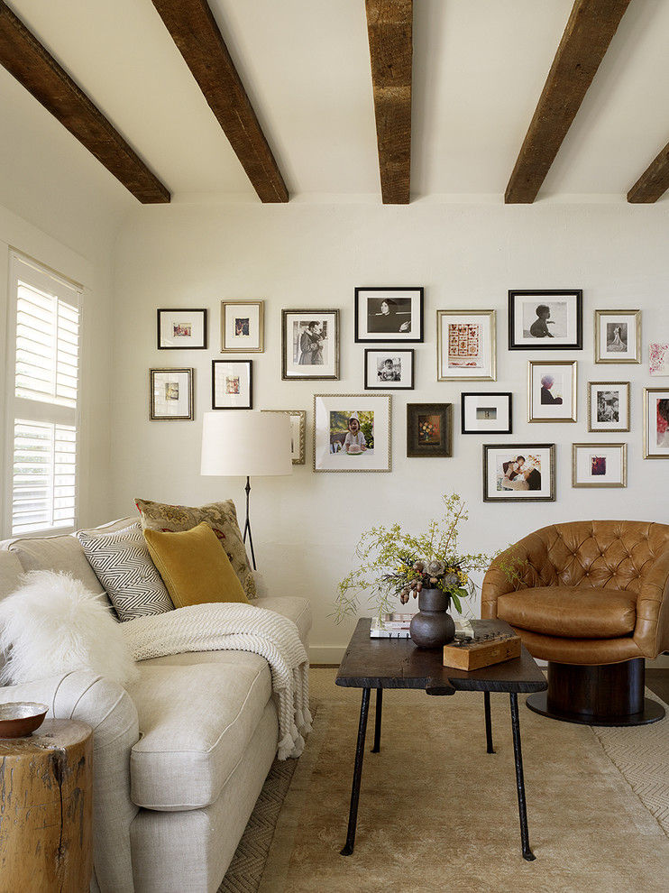 This is an example of a country living room in San Francisco with white walls.