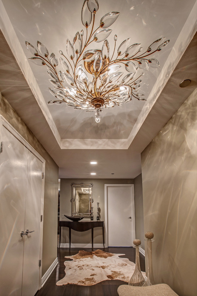 Trendy entryway photo in Chicago with a white front door and gray walls