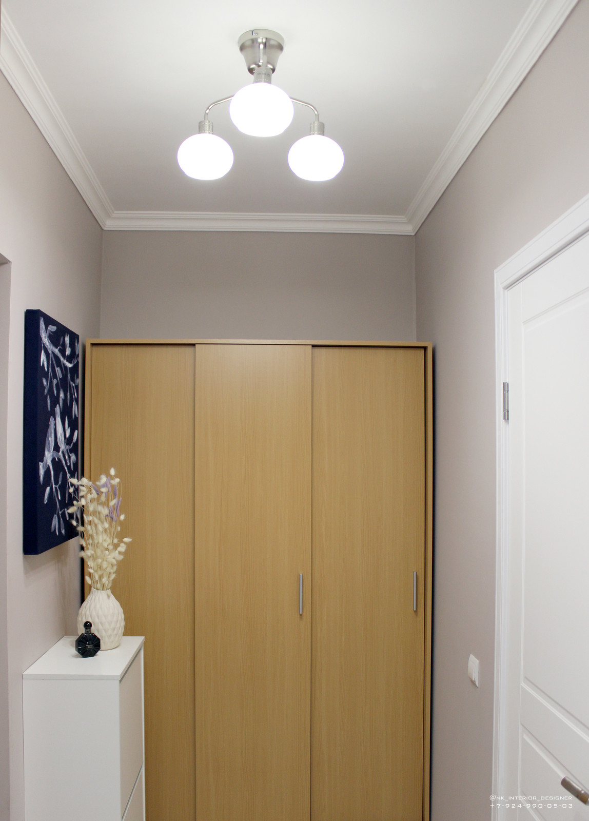 спрятали щиток за картиной