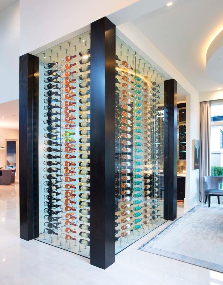 Design ideas for a contemporary wine cellar in Nashville with display racks and white floor.