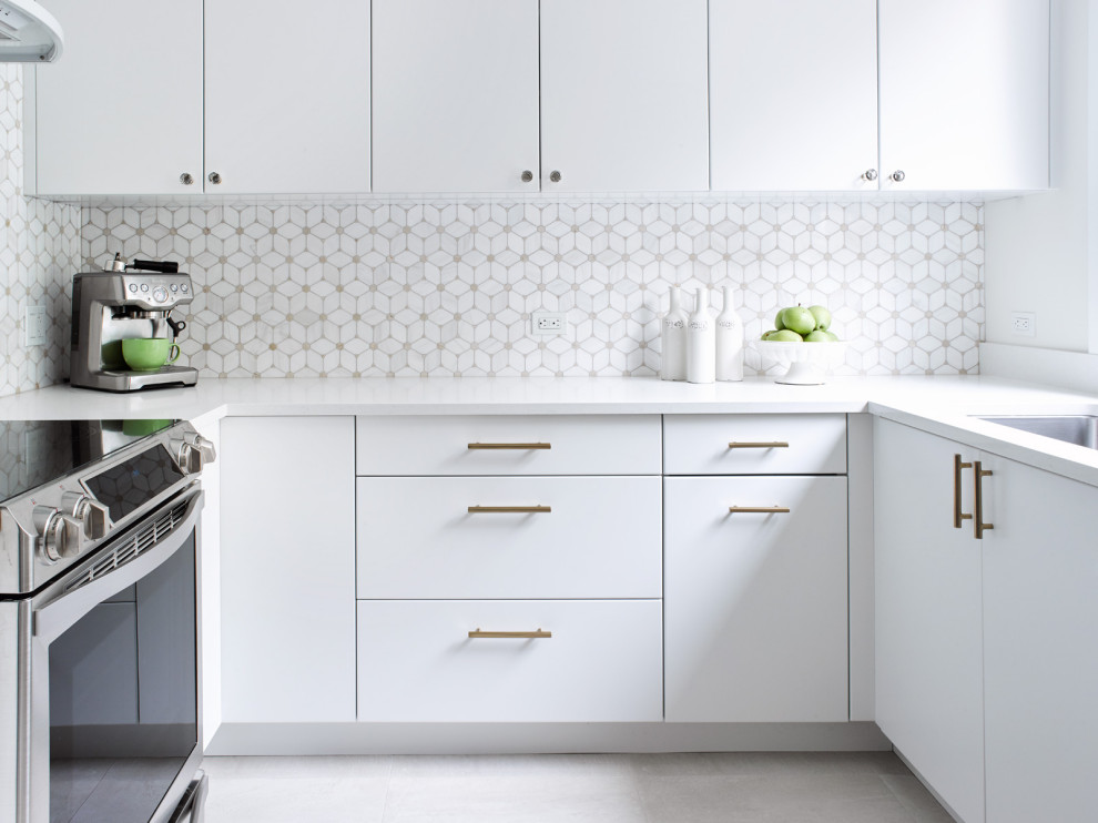 This is an example of a small modern u-shaped separate kitchen in Toronto with a double-bowl sink, flat-panel cabinets, white cabinets, quartz benchtops, multi-coloured splashback, mosaic tile splashback, stainless steel appliances, porcelain floors, no island, beige floor and white benchtop.