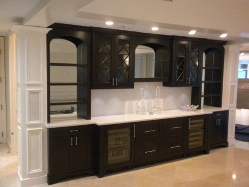 Large transitional kitchen/dining combo in Miami.