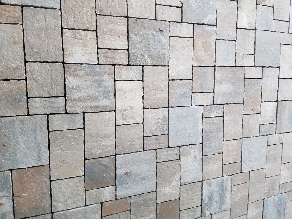 Inspiration for a large transitional backyard stone and custom-shaped natural hot tub remodel in Miami
