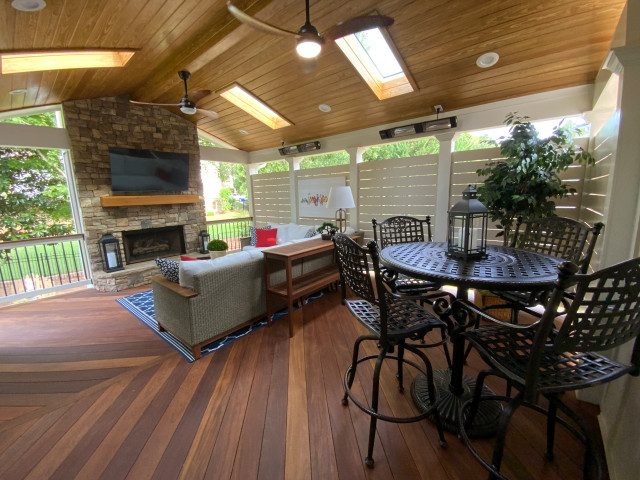 Open Porch with Fireplace in Suwanee, GA contemporary-veranda