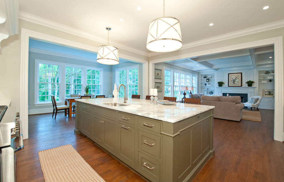 Design ideas for a large traditional l-shaped eat-in kitchen in Philadelphia with a single-bowl sink, beaded inset cabinets, green cabinets, marble benchtops, white splashback, stainless steel appliances, medium hardwood floors and with island.