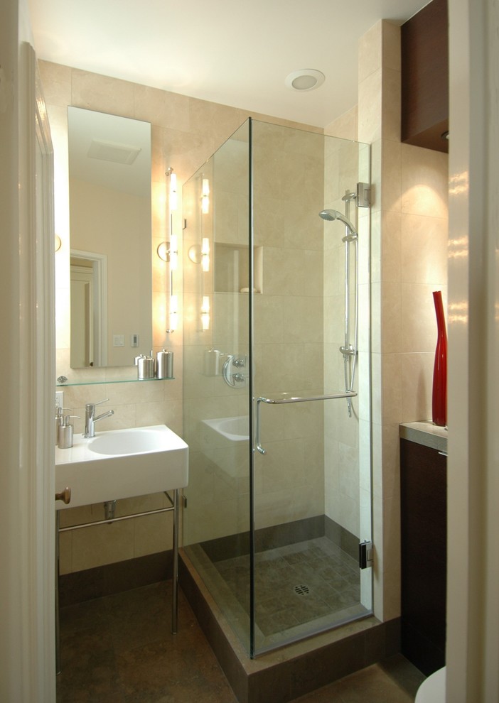 This is an example of a contemporary bathroom in San Francisco with stone tile.