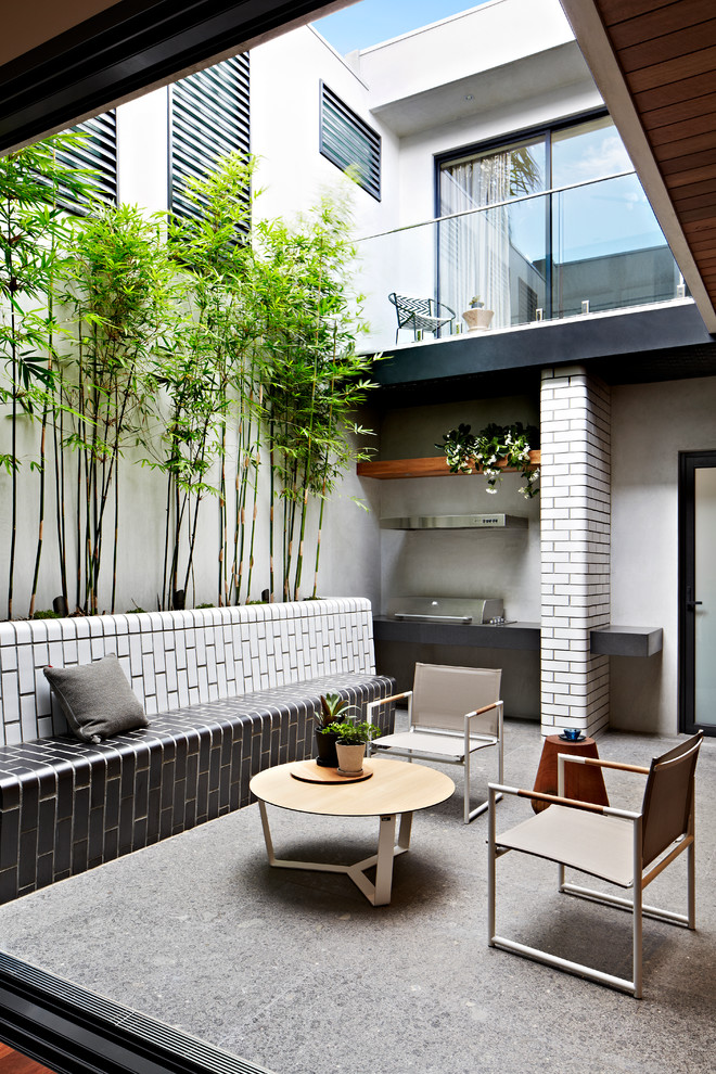 This is an example of a small contemporary courtyard garden in Melbourne.