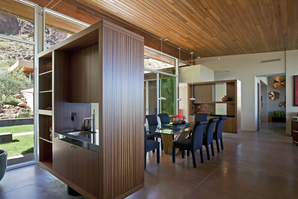 This is an example of a contemporary dining room in Phoenix.