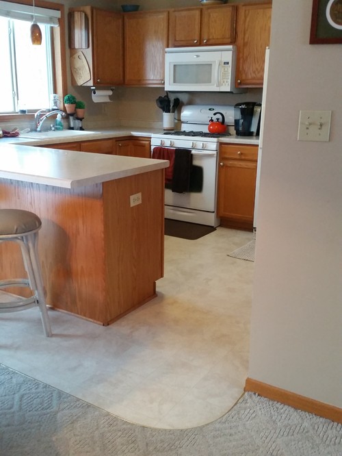 Need design advice for flooring with honey oak cabinets