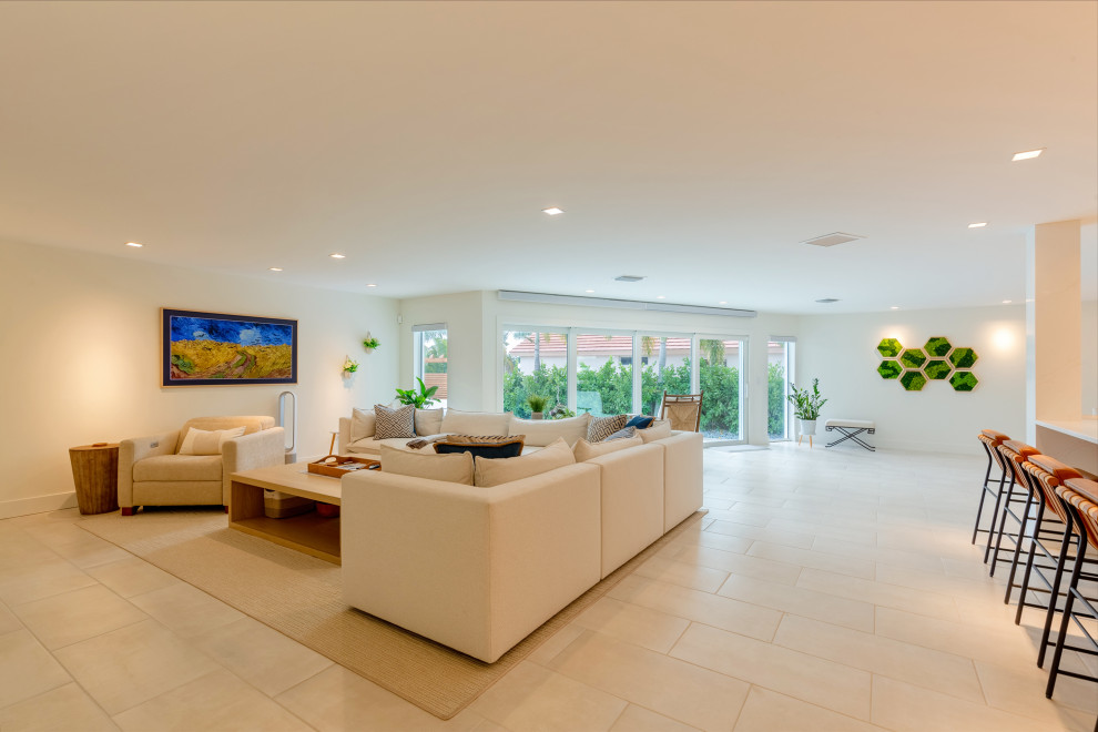 Minimalist Open-Concept Living Room with Natural Light and Garden Views ...