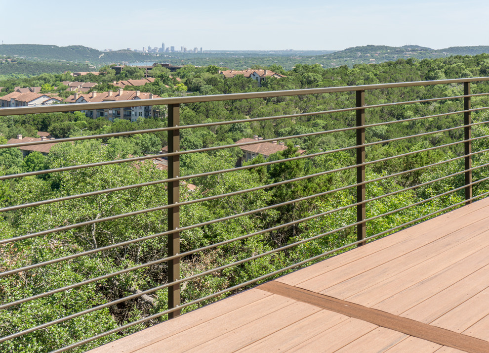 Design ideas for a large contemporary backyard deck in Austin with no cover.