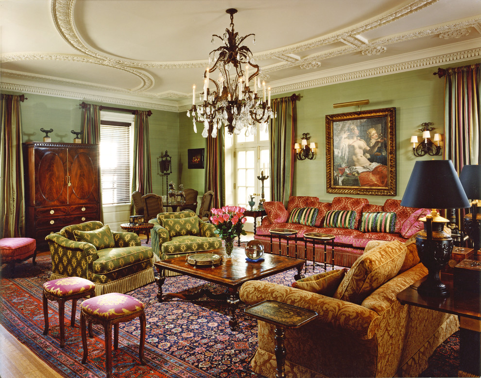 Photo of a traditional formal enclosed living room in Philadelphia with green walls, medium hardwood floors and no tv.