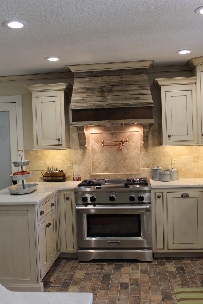Inspiration for a large rustic l-shaped porcelain tile eat-in kitchen remodel with a farmhouse sink, quartzite countertops, stainless steel appliances and an island