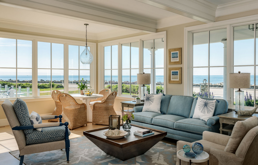 Example of a beach style living room design in Boston