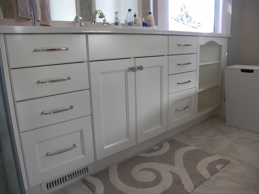 Inspiration for a mid-sized transitional master and u-shaped beige tile and glass tile medium tone wood floor and brown floor eat-in kitchen remodel in Edmonton with granite countertops, beige walls, an undermount sink, recessed-panel cabinets, white cabinets, marble countertops, gray backsplash, matchstick tile backsplash, stainless steel appliances and an island