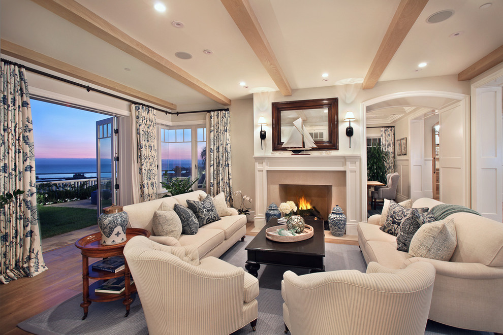 Design ideas for a traditional enclosed living room in Orange County with a standard fireplace.