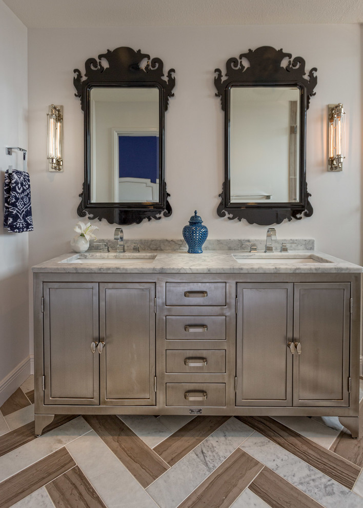 Transitional bathroom in Austin with an undermount sink, gray tile and white walls.