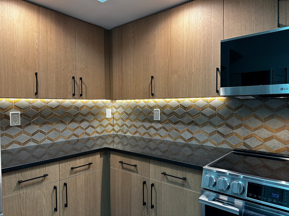 Small eclectic u-shaped vinyl floor, gray floor and vaulted ceiling kitchen pantry photo in Seattle with a double-bowl sink, flat-panel cabinets, brown cabinets, quartz countertops, brown backsplash, porcelain backsplash, stainless steel appliances, a peninsula and black countertops