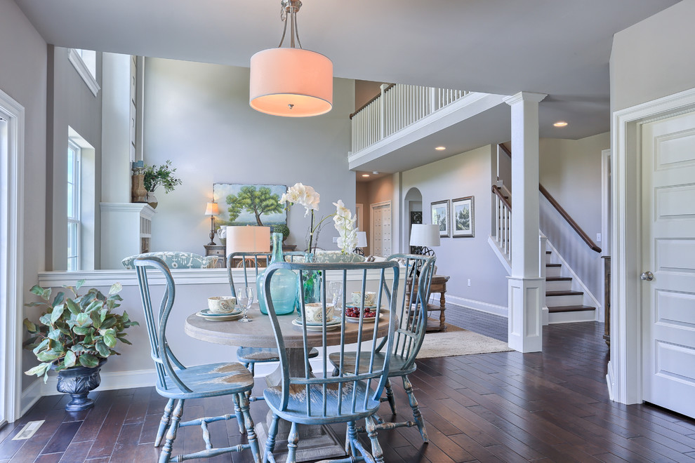 Example of a large transitional dark wood floor kitchen/dining room combo design