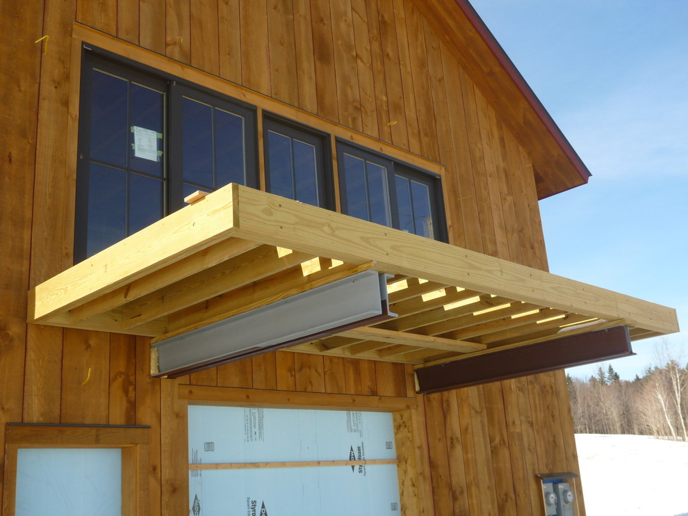 Mountain style deck photo in Burlington