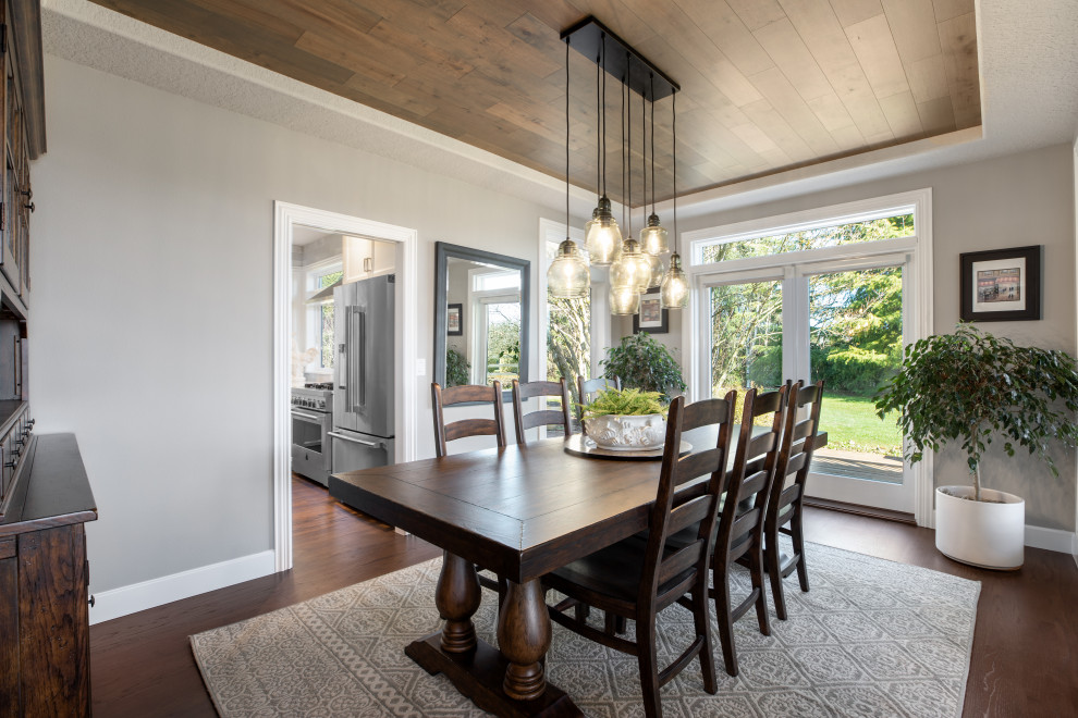 Medium sized classic enclosed dining room in Portland with grey walls, dark hardwood flooring, no fireplace, brown floors and a wood ceiling.