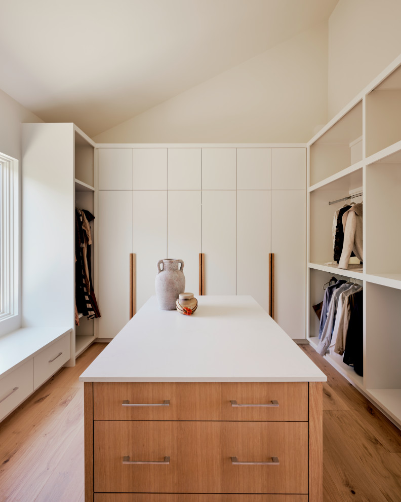 Example of a transitional closet design in Austin