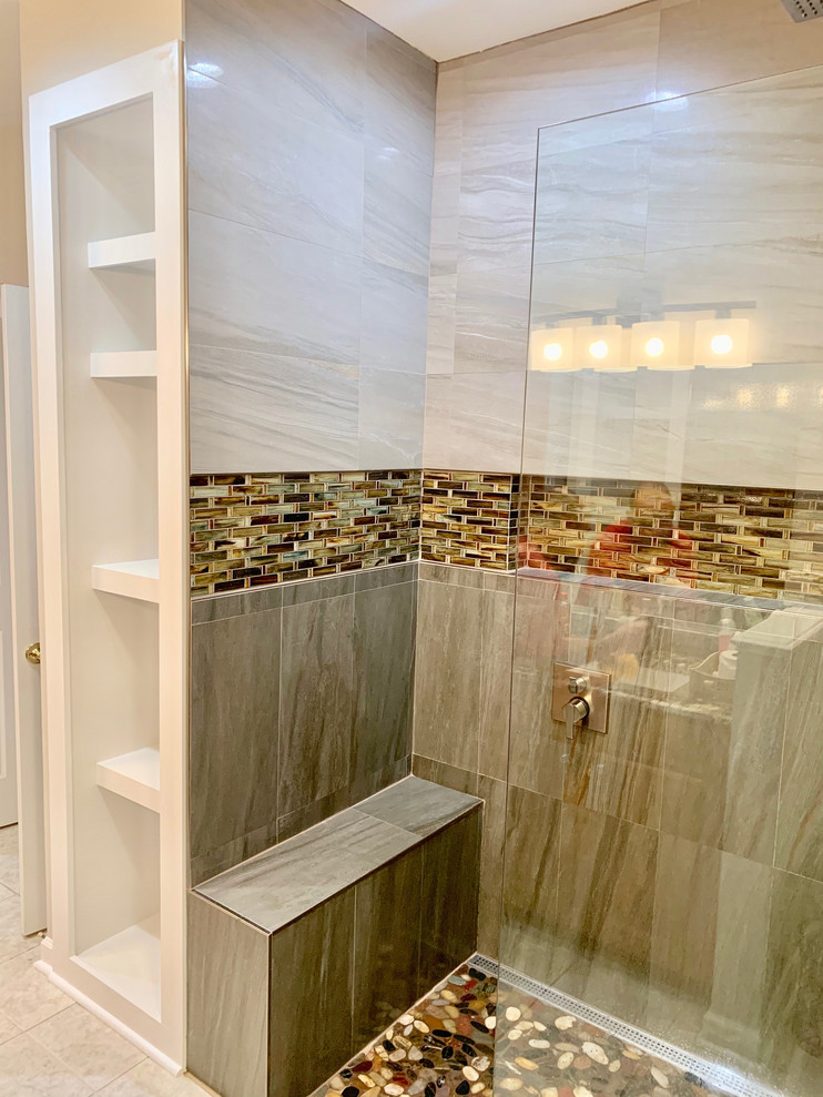 Inspiration for a mid-sized contemporary master beige tile and porcelain tile walk-in shower remodel