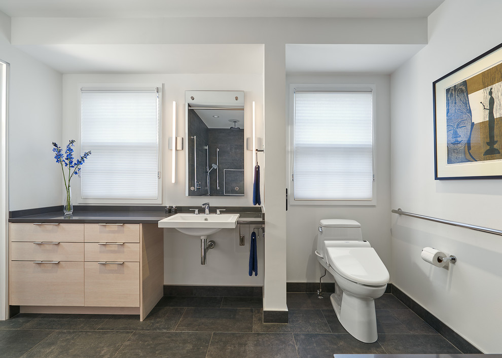 Photo of a large contemporary master bathroom in DC Metro with flat-panel cabinets, beige cabinets, an alcove tub, an open shower, gray tile, grey walls, engineered quartz benchtops, grey floor and an open shower.
