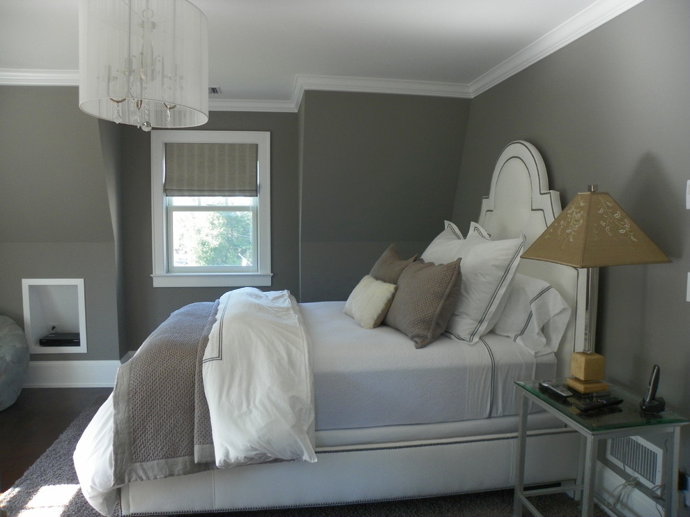 Traditional bedroom in New York with grey walls.