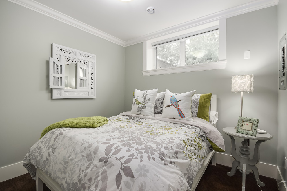 Design ideas for a mid-sized arts and crafts guest bedroom in Vancouver with green walls and carpet.