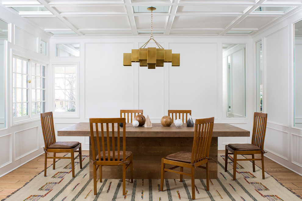 Inspiration for a mid-sized transitional separate dining room in Los Angeles with white walls, light hardwood floors, no fireplace and brown floor.