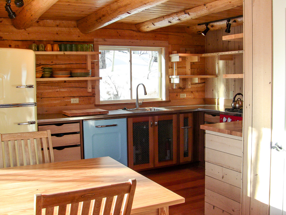 Mountain style home design photo in Denver