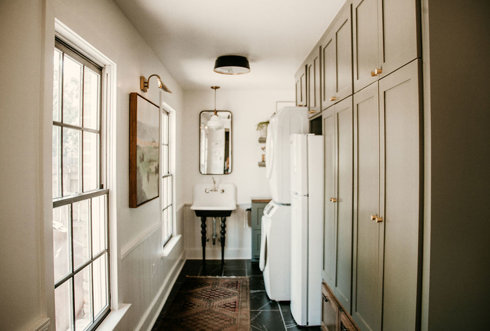 Inspiration for a mid-sized industrial u-shaped dedicated laundry room in Other.