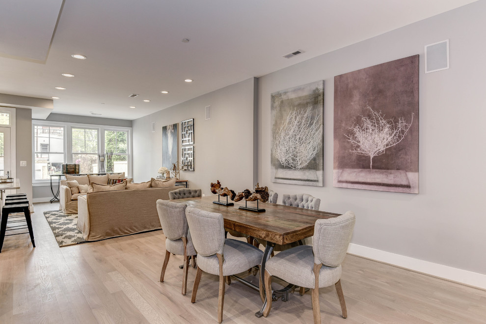 Inspiration for a large transitional open plan dining in DC Metro with grey walls, light hardwood floors and no fireplace.