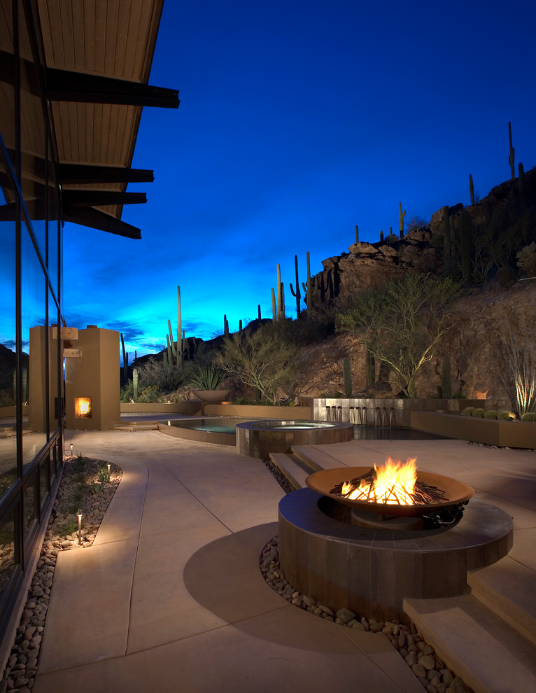 Patio in Phoenix with a fire feature.