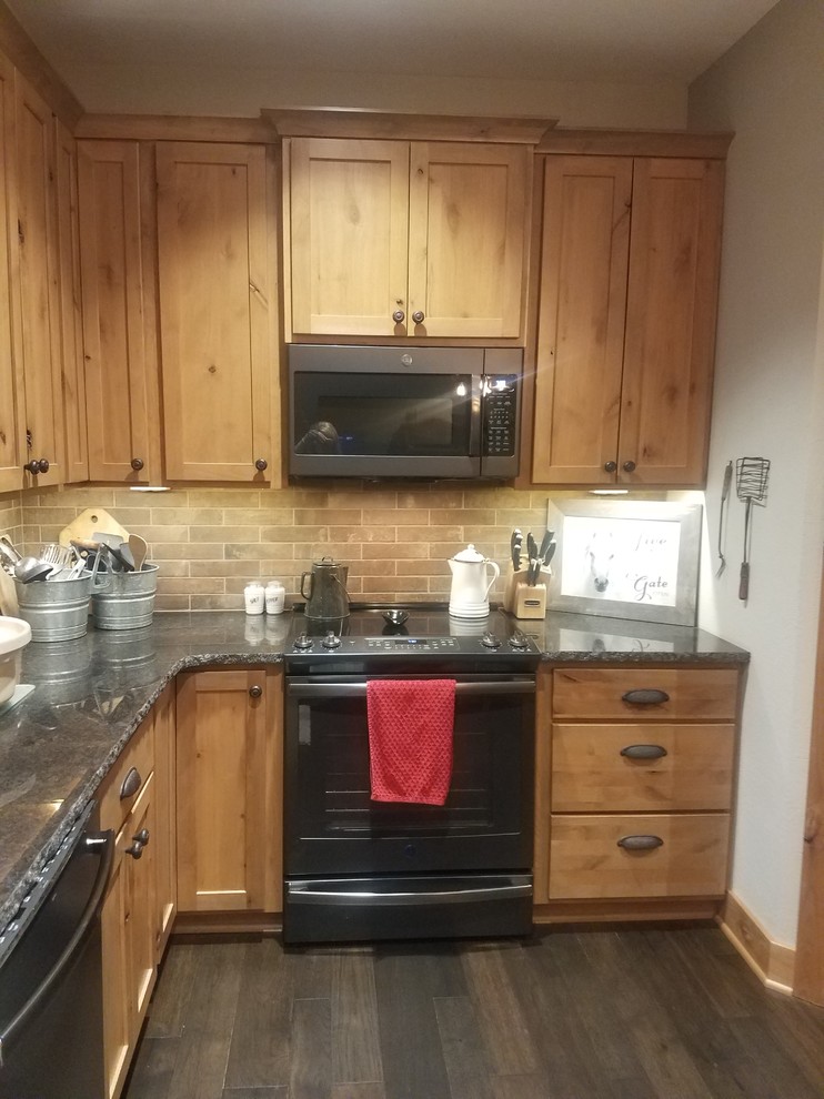 Example of a mountain style kitchen design in Omaha