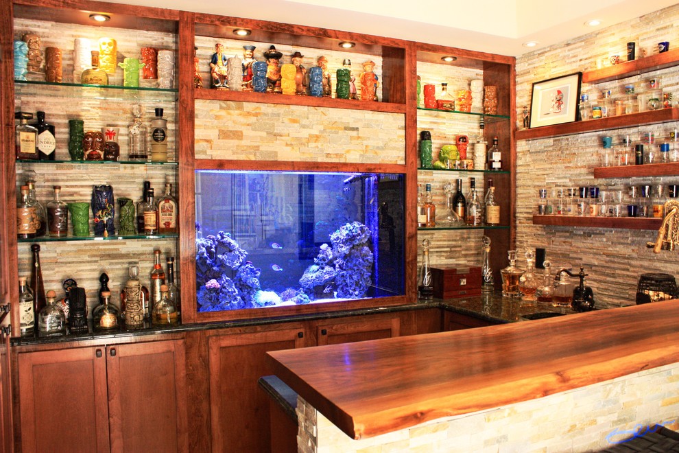 Design ideas for a small arts and crafts u-shaped wet bar in Dallas with an undermount sink, shaker cabinets, brown cabinets, granite benchtops, multi-coloured splashback, stone tile splashback, medium hardwood floors and brown floor.