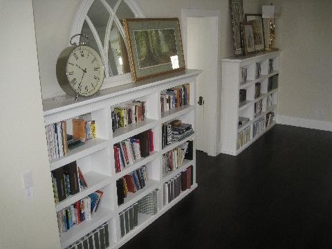 Inspiration for a mid-sized transitional carpeted hallway remodel in Las Vegas with beige walls