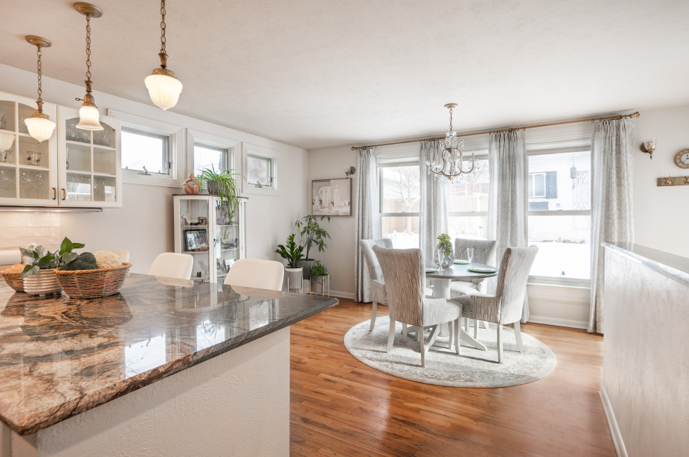 Example of a transitional kitchen design in Denver