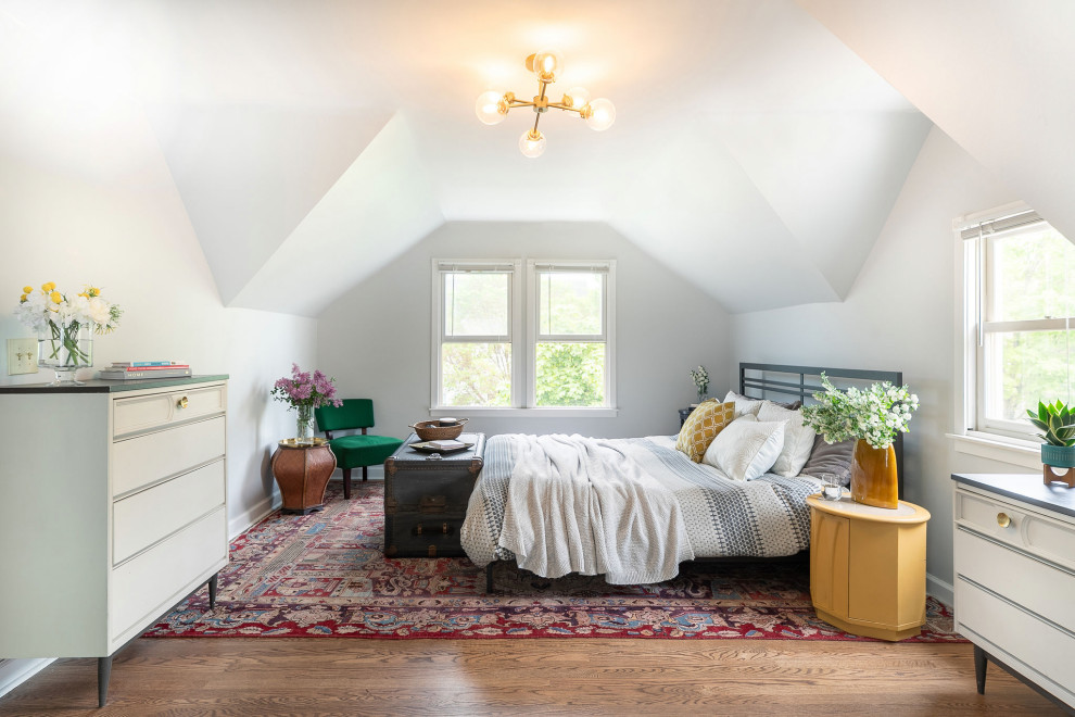 Bedroom - mediterranean master light wood floor and brown floor bedroom idea in Chicago