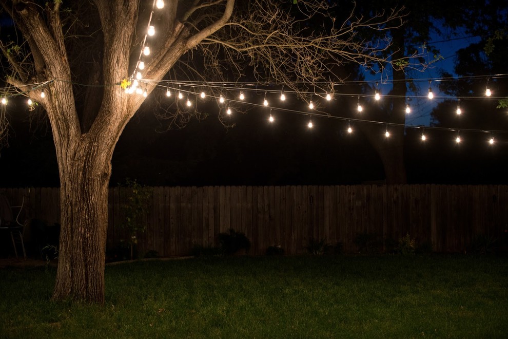 This is an example of a transitional backyard landscaping.