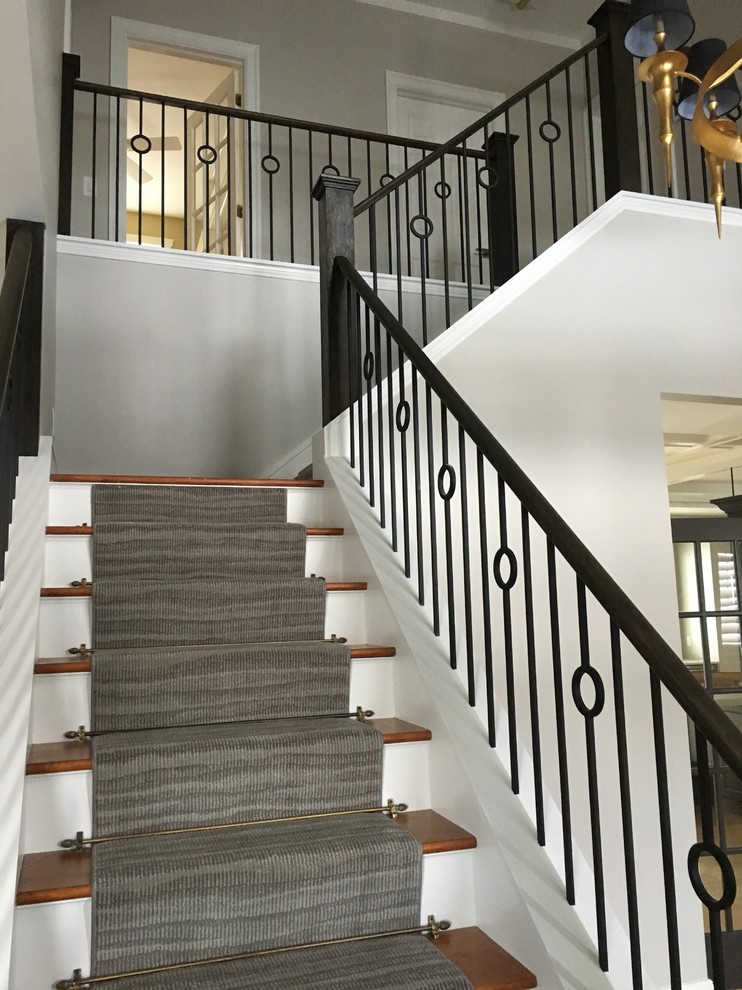 Mid-sized transitional wooden l-shaped wood railing staircase photo with painted risers